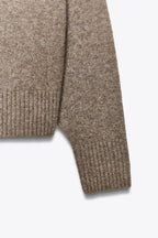 SOFT KNIT V-NECK SWEATER.